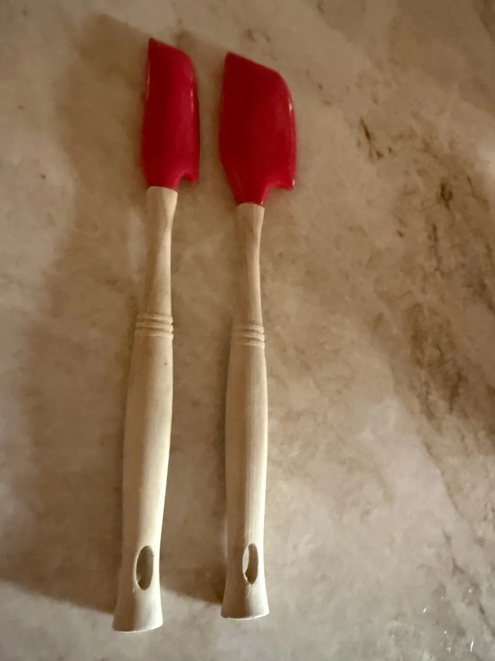 Le Creuset silicone mixing spatulas in Cerise (red)